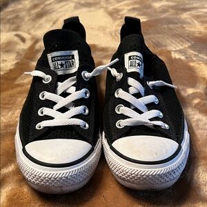 Women’s black/white Converse All Stars. Gently worn.